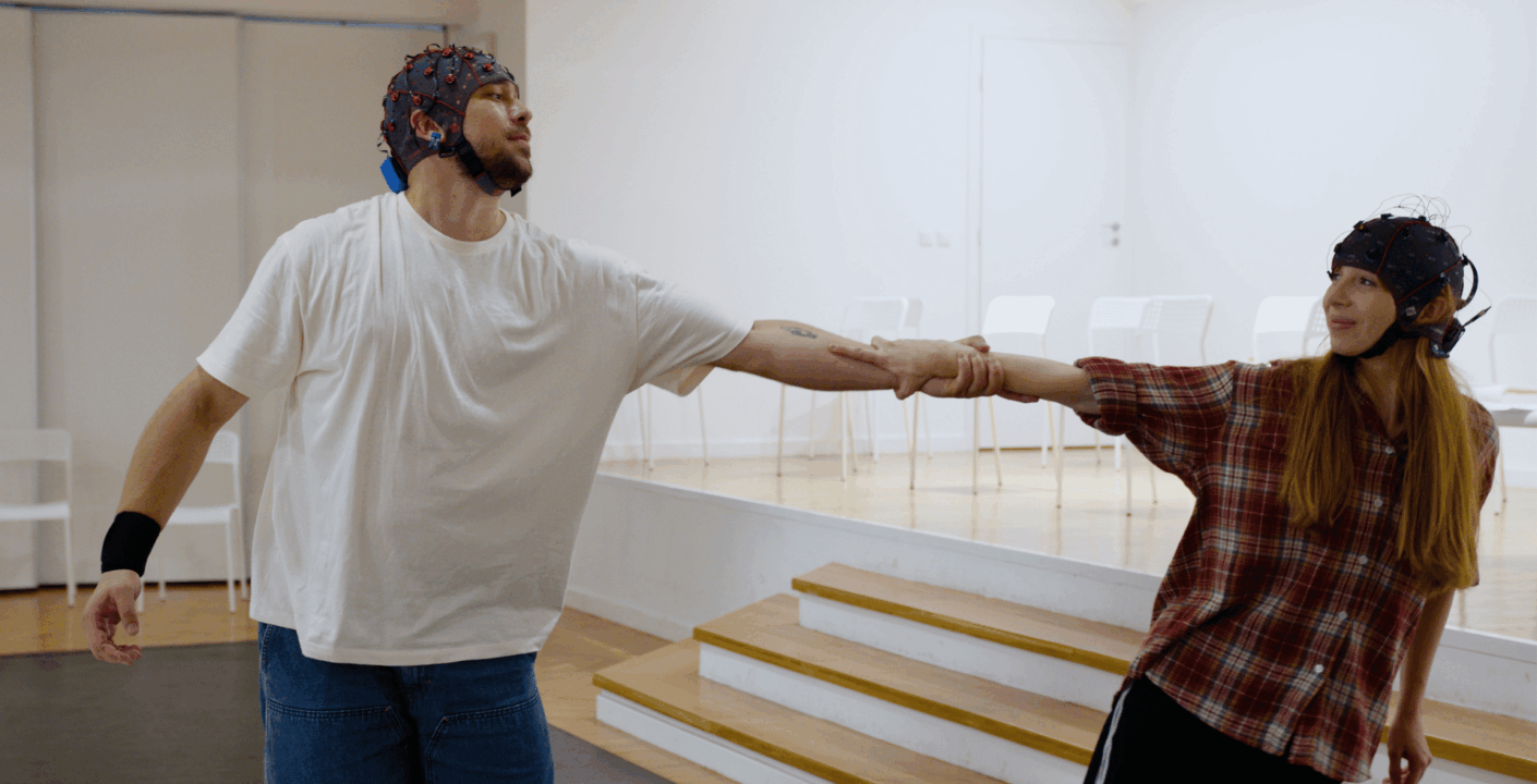 dancers with neuroscience caps